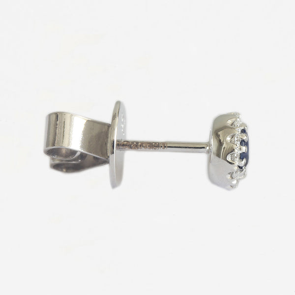 a pair of new sapphire and diamond cluster studs