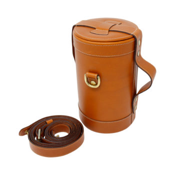 a 3 set decanter bar in tan leather