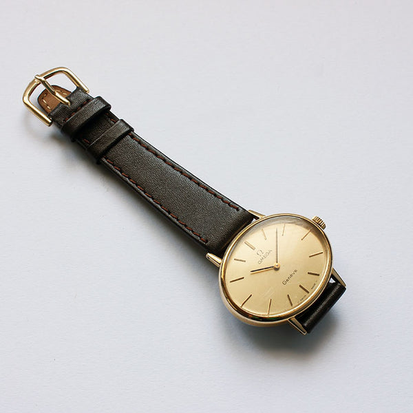 a vintage mens or women's oval gold plate watch with brown leather strap vintage design at marston barrett in lewes