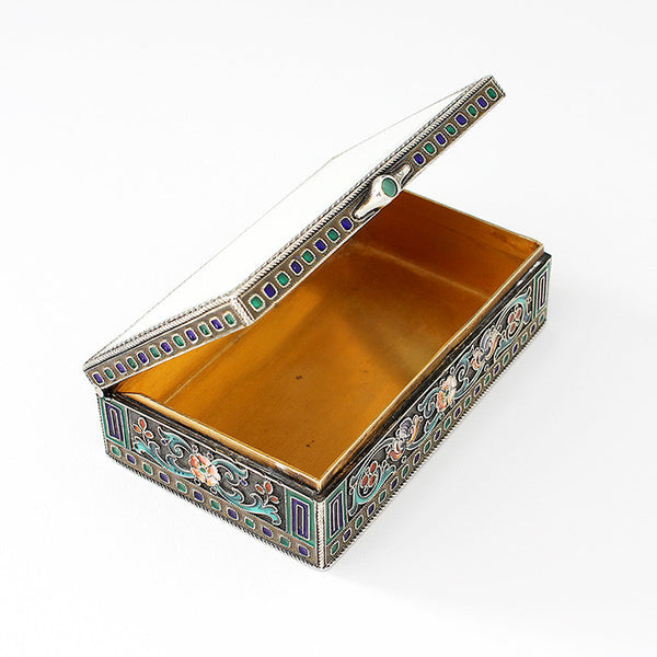 a stunning enamel and silver gilt trinket box with green stone thumb piece antique