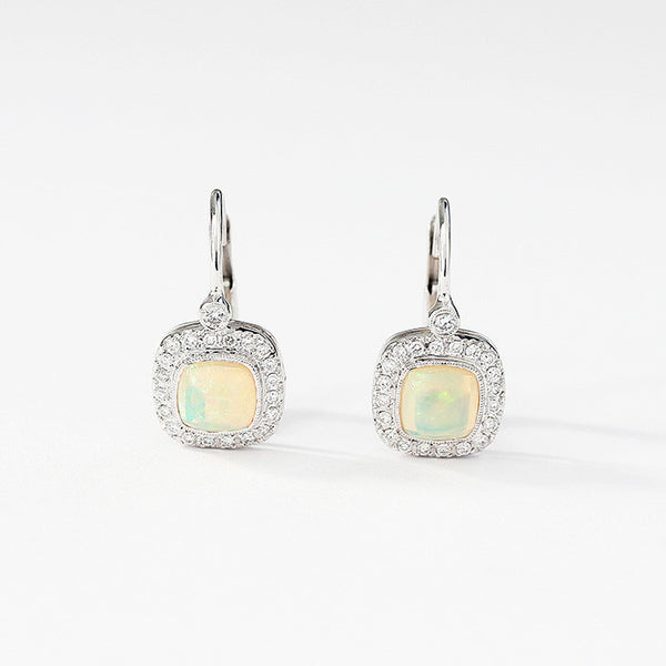 opal and diamond cluster earrings with a hook fitting set in white gold