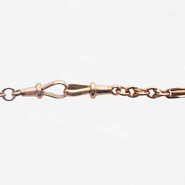 Rose gold bracelet on a white background