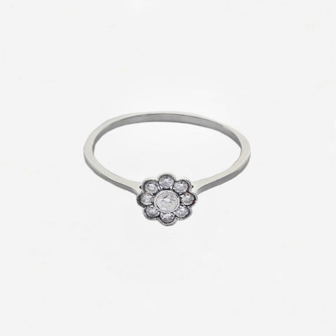 diamond cluster ring facing front white gold band with white background