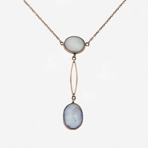 oval double opal drop pendant on gold chain with white background