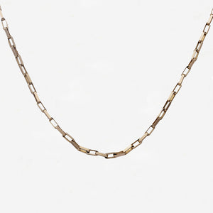 yellow rectangular paper link chain on white background