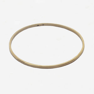 yellow plain bangle on white background