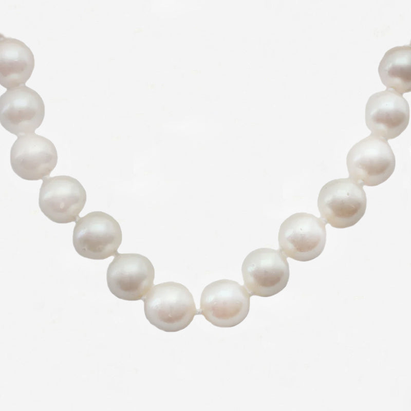 single row of white pearls