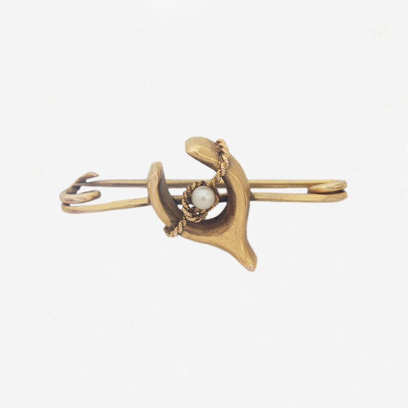 a preowned yellow gold wishbone pearl brooch with rope entwined
