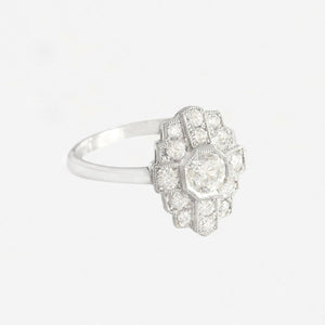 an Art Deco style diamond set ring in platinum heritage range