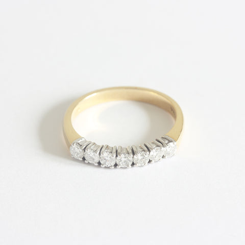 a diamond set half eternity ring wedding ring