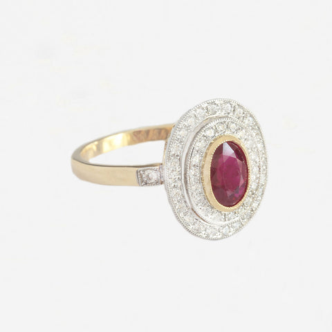 a diamond and ruby target ring in platinum and 18ct gold