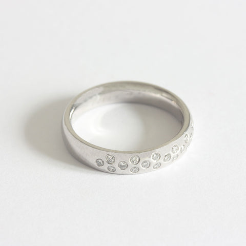a platinum nineteen stone diamond wedding ring
