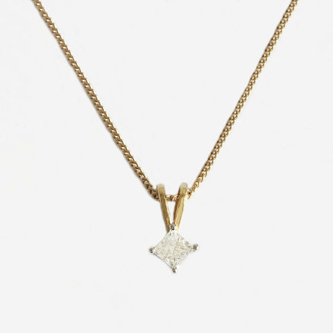 a gold princess cut square diamond solitaire pendant necklace