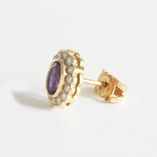 a beautiful pair of amethyst diamond cluster earrings studs