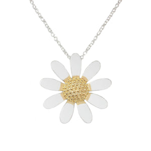 a large daisy pendant on a chain in silver and gold plate