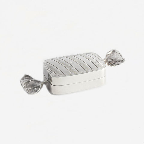 a silver pill box sweet design shape with full hallmark