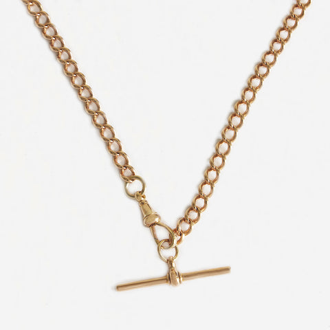 a secondhand 15 carat yellow gold Albert watch chain with t bar attached