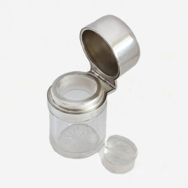 a glass and silver scent bottle dated Sheffield 1909