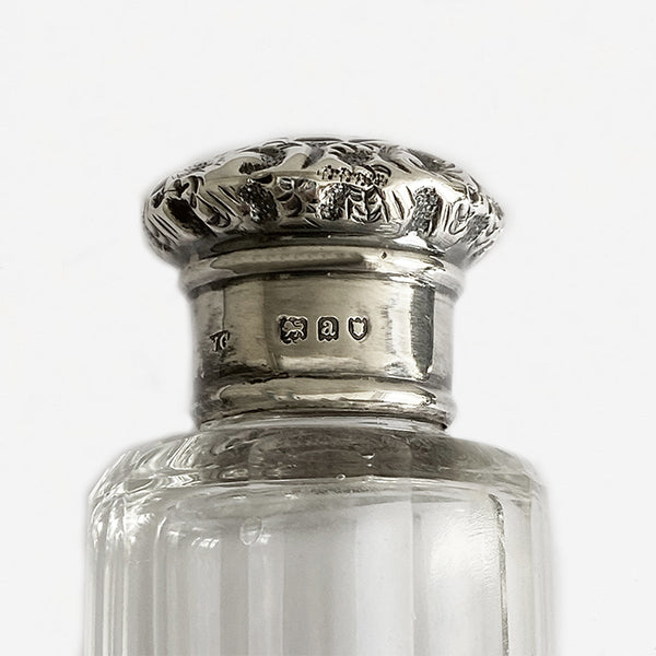 a glass and silver victorian hatpin bottle dated 1896
