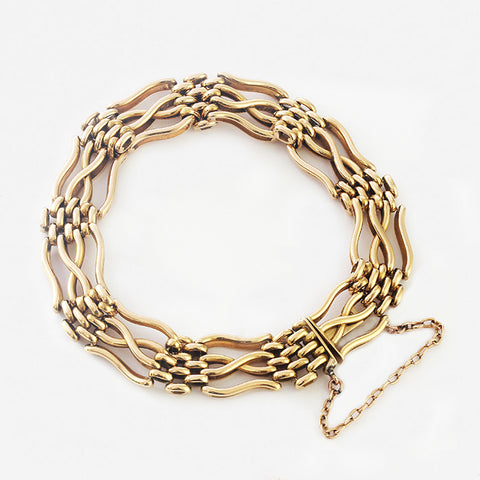 a secondhand heavy 18 carat gold gate bracelet with safety chain