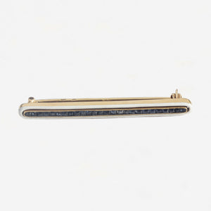 a preowned sapphire and white enamel bar brooch yellow gold 