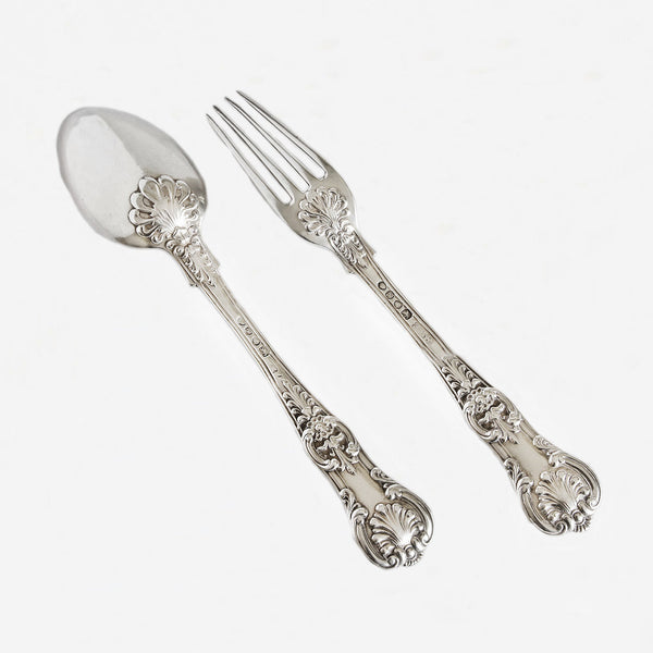 an antique scroll design fork and spoon set in silver dated 1836
