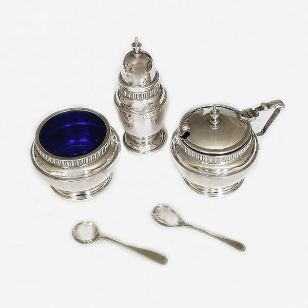 a superb silver cruet set spoons mustard pot dated 1940
