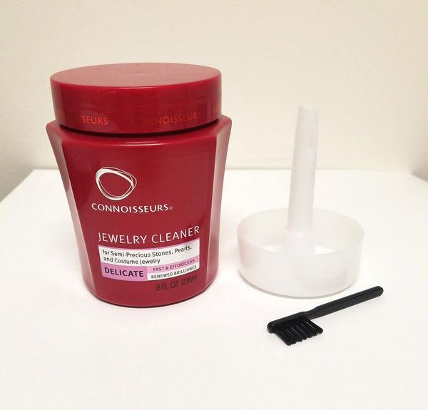 connoisseurs jewellery cleaner for gold plated jewellery, semi-precious and delicate stones such as pearls, opals, turquoise, coral and onyx. With brush