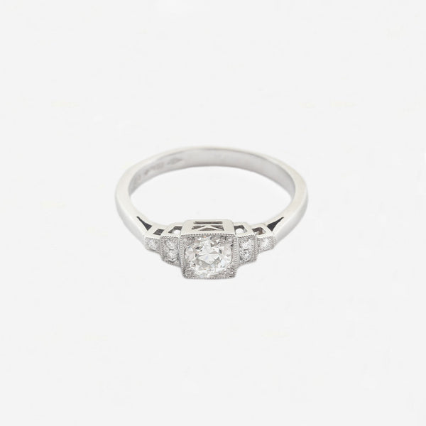 Front view of a diamond ring set in platinum. 