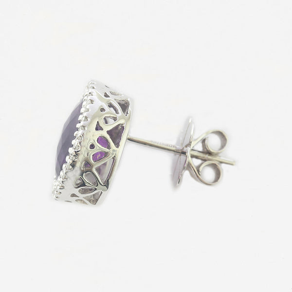a modern oval claw set cluster stud earring with amethyst and diamonds