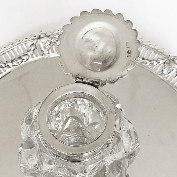 a victorian silver ink stand dated 1871 with head design
