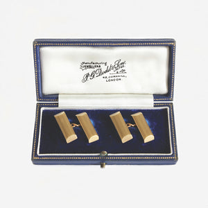 a set of engine turned bar cufflinks in yellow gold with vintage box dated 1963