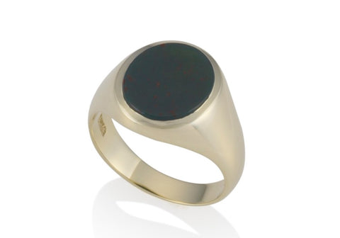 a gold oval stone set signet ring 14.5mm x 12.5mm
