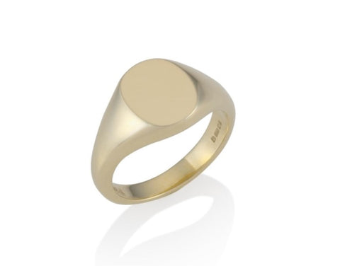a gold oval signet ring 11mm x 9mm