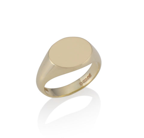 a gold reverse oval signet ring 11mm x 14mm