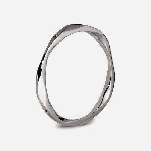 a contemporary orbital design sterling silver bangle with a polished finish