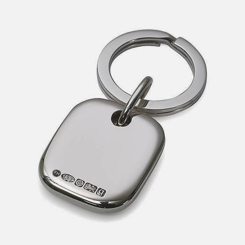 a silver heavy rounded block shape key ring with a full hallmark for sheffield