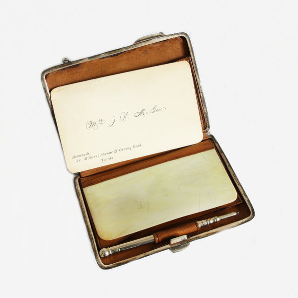 an Edwardian silver finger purse and pencil dated 1904