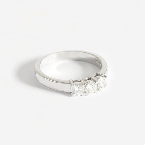 a beautiful platinum 3 stone diamond round stone ring in claw setting