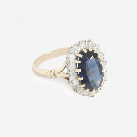 sapphire and diamond cluster ring in yellow gold and white gold