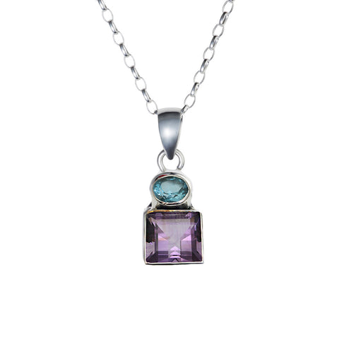 a silver pendant with oval blue topaz sqaure amethyst necklace by christin ranger