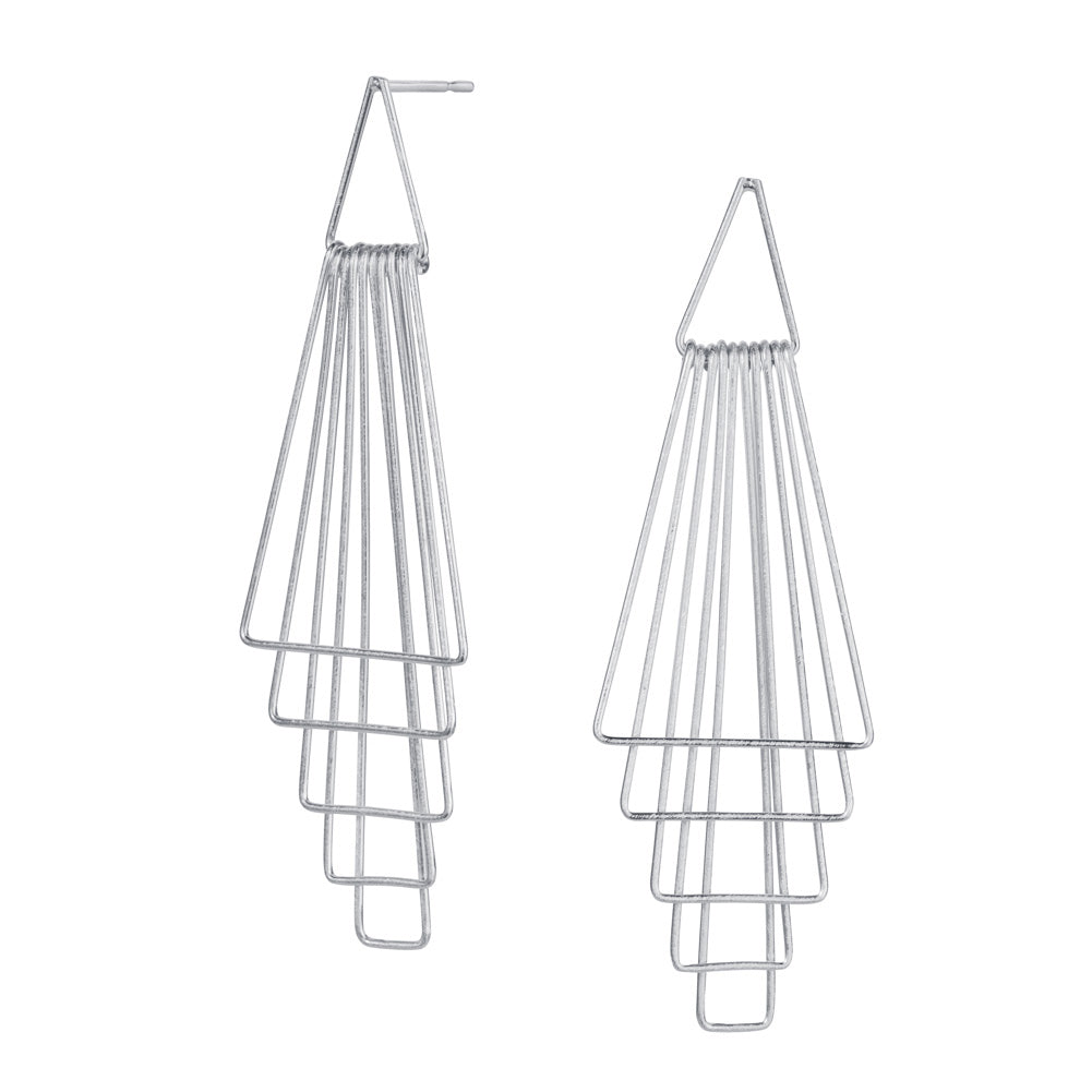 a pair of silver pyramid design drop earrings by christin ranger