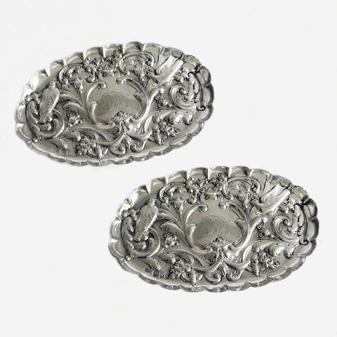 a pair of silver embossed birds flower design tray dated 1893