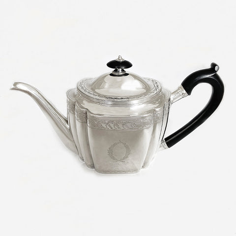 a superb antique george third silver teapot dated London 1800 with family crest lion anchor