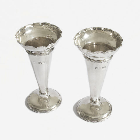 a pair of plain trumpet vases London 1924