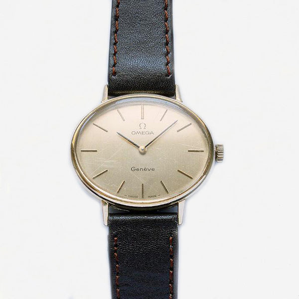 a vintage mens or women's oval gold plate watch with brown leather strap vintage design at marston barrett in lewes