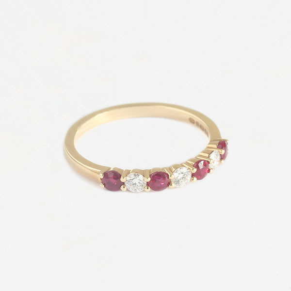 a new ruby and diamond ring in yellow gold with claw settings