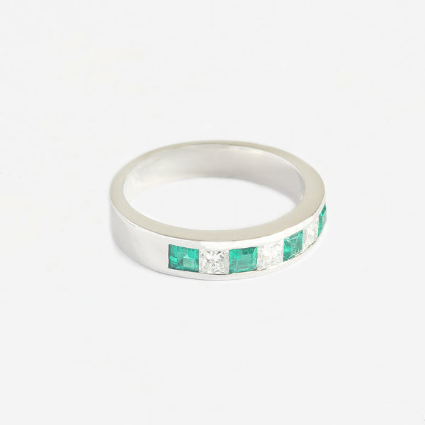 a superb diamond emerald platinum half eternity ring