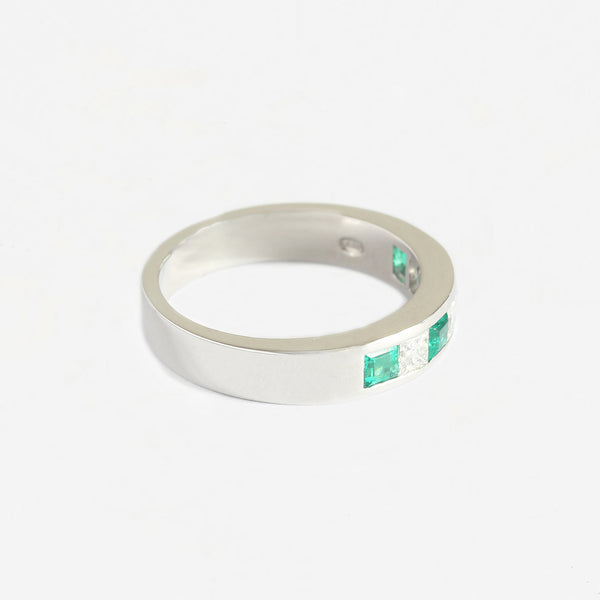 an emerald diamond half eternity ring platinum with square stones