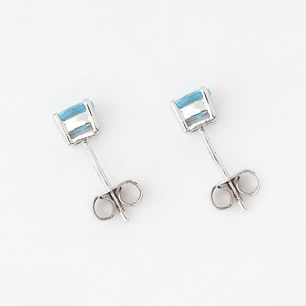 silver round blue topaz stud earrings in 5mm diameter and 4 claws
